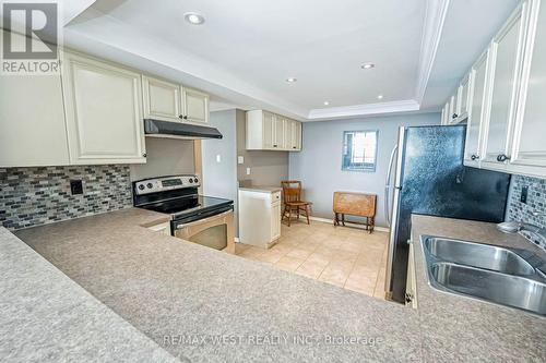 606 - 320 Mill Street S, Brampton, ON - Indoor Photo Showing Kitchen With Double Sink