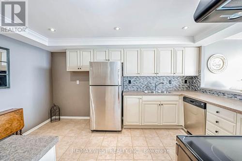 606 - 320 Mill Street S, Brampton, ON - Indoor Photo Showing Kitchen With Double Sink