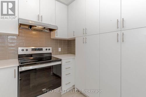 419 - 3220 William Coltson Avenue, Oakville, ON - Indoor Photo Showing Kitchen