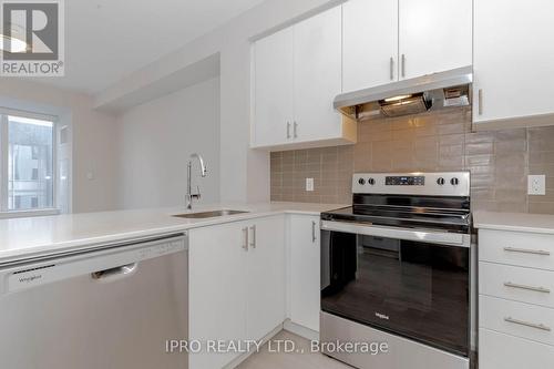 419 - 3220 William Coltson Avenue, Oakville, ON - Indoor Photo Showing Kitchen