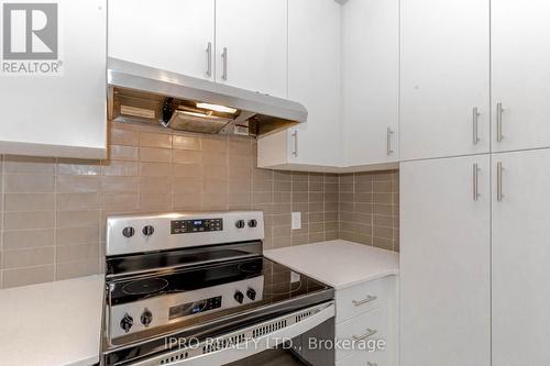 419 - 3220 William Coltson Avenue, Oakville, ON - Indoor Photo Showing Kitchen