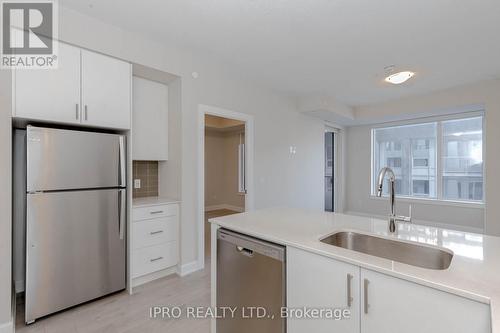 419 - 3220 William Coltson Avenue, Oakville, ON - Indoor Photo Showing Kitchen