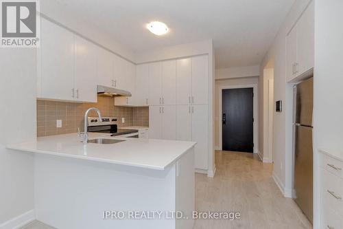 419 - 3220 William Coltson Avenue, Oakville, ON - Indoor Photo Showing Kitchen