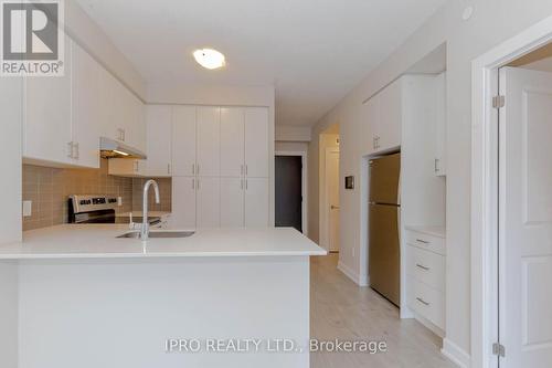 419 - 3220 William Coltson Avenue, Oakville, ON - Indoor Photo Showing Kitchen