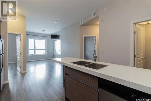 313 225 Maningas Bend, Saskatoon, SK - Indoor Photo Showing Kitchen With Double Sink