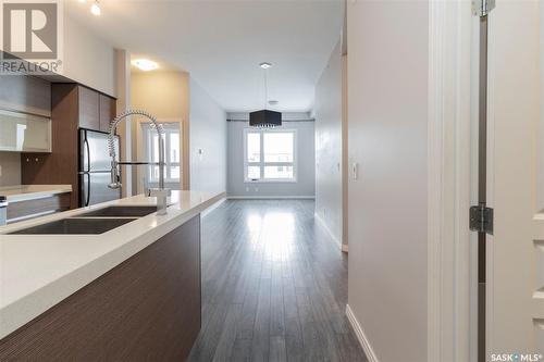 313 225 Maningas Bend, Saskatoon, SK - Indoor Photo Showing Kitchen With Double Sink