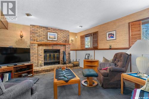 847 Delaronde Way, Saskatoon, SK - Indoor Photo Showing Living Room With Fireplace