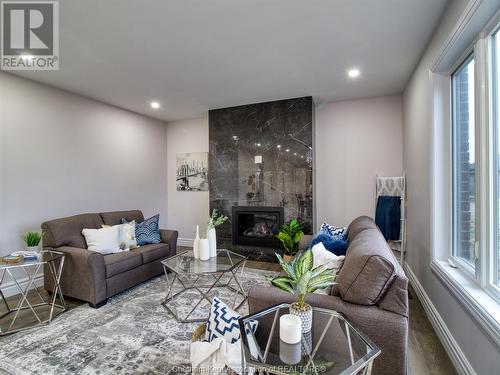 15 Dundee Drive, Chatham, ON - Indoor Photo Showing Living Room With Fireplace