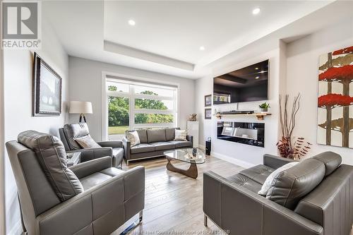 241 Sandybrook, Kingsville, ON - Indoor Photo Showing Living Room With Fireplace