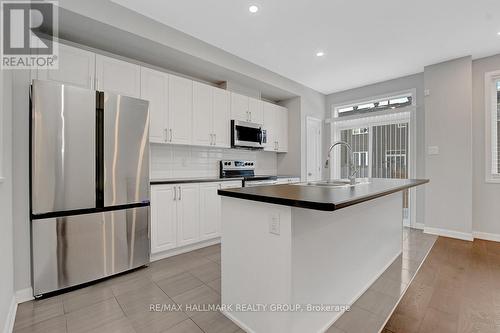 75 Gardenpost Terrace, Ottawa, ON - Indoor Photo Showing Kitchen With Double Sink