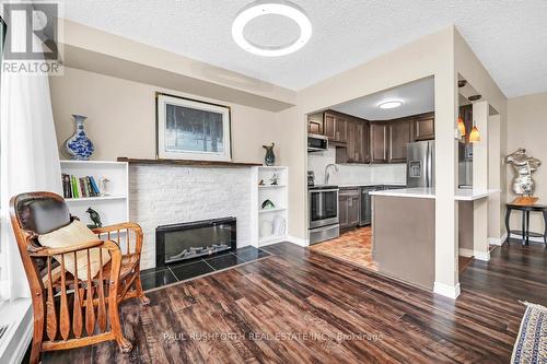 211 - 265 Poulin Avenue, Ottawa, ON - Indoor With Fireplace