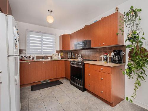 Kitchen - 949  - 951 Av. Châtelaine, Laval (Chomedey), QC - Indoor Photo Showing Kitchen With Double Sink