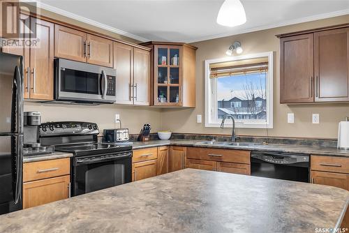 306 110 Shillington Crescent, Saskatoon, SK - Indoor Photo Showing Kitchen With Double Sink