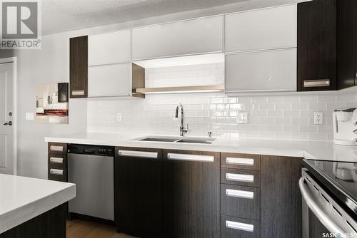 208 1640 Dakota Drive, Regina, SK - Indoor Photo Showing Kitchen With Stainless Steel Kitchen With Double Sink With Upgraded Kitchen