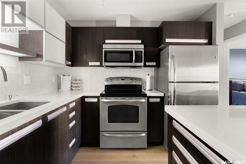 208 1640 Dakota Drive, Regina, SK - Indoor Photo Showing Kitchen With Stainless Steel Kitchen With Double Sink With Upgraded Kitchen