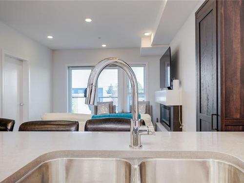 303-745 Travino Lane, Saanich, BC - Indoor Photo Showing Kitchen With Double Sink