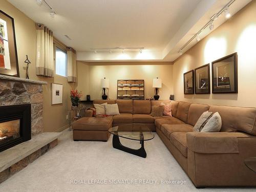 54 Stillwater Cres, Toronto, ON - Indoor Photo Showing Living Room With Fireplace