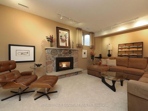 54 Stillwater Cres, Toronto, ON - Indoor Photo Showing Living Room With Fireplace