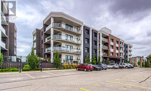 303 - 249 Grey Silo Road, Waterloo, ON - Outdoor With Balcony With Facade