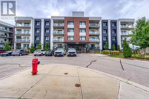 303 - 249 Grey Silo Road, Waterloo, ON - Outdoor With Balcony With Facade