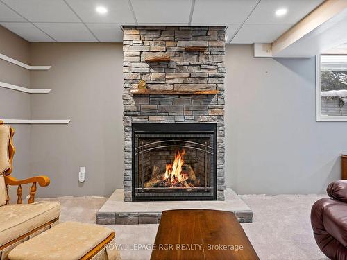 556252 Mulmur Melancthon Town Line, Melancthon, ON - Indoor Photo Showing Living Room With Fireplace