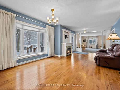 556252 Mulmur Melancthon Town Line, Melancthon, ON - Indoor Photo Showing Living Room With Fireplace