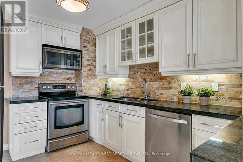 402 - 1 Aberfoyle Crescent Street, Toronto, ON - Indoor Photo Showing Kitchen With Double Sink With Upgraded Kitchen