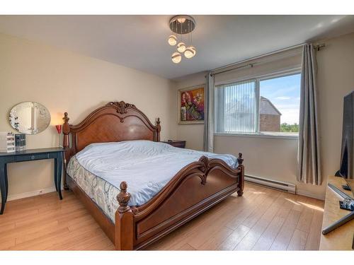 Chambre Ã  coucher principale - 9660 Rue Riverin, Brossard, QC - Indoor Photo Showing Bedroom