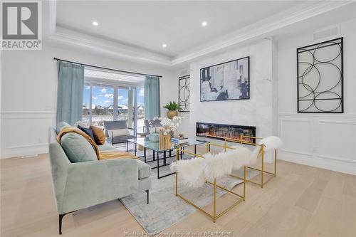 11 Cypress Pointe, Leamington, ON - Indoor Photo Showing Living Room With Fireplace