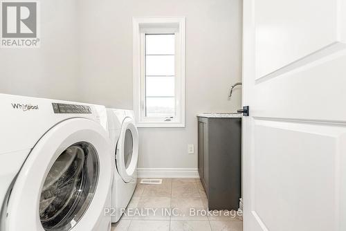 49 Periwinkle Road, Springwater, ON - Indoor Photo Showing Laundry Room