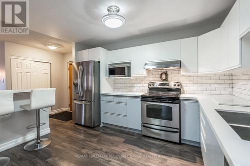 303 - 131 Clapperton Street, Barrie, ON - Indoor Photo Showing Kitchen With Stainless Steel Kitchen With Double Sink With Upgraded Kitchen