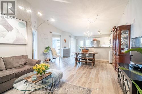 410 - 2085 Appleby Line, Burlington, ON - Indoor Photo Showing Living Room