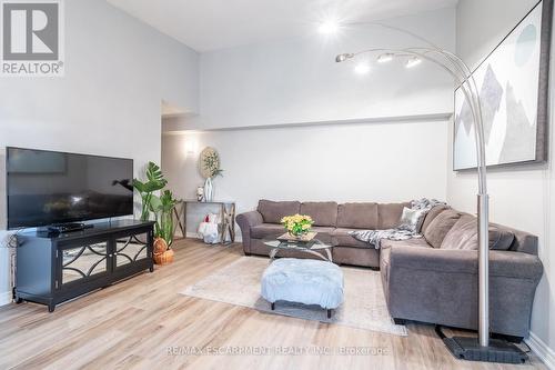 410 - 2085 Appleby Line, Burlington, ON - Indoor Photo Showing Living Room