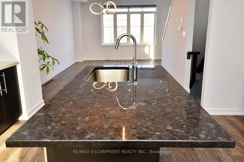 123 - 1890 Rymal Road E, Hamilton, ON - Indoor Photo Showing Kitchen With Double Sink