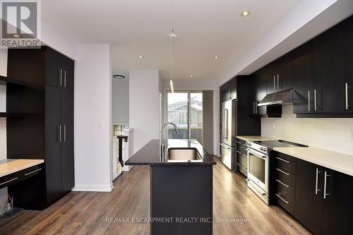 123 - 1890 Rymal Road E, Hamilton, ON - Indoor Photo Showing Kitchen With Upgraded Kitchen