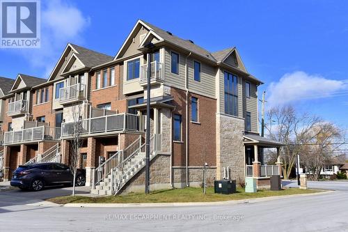 123 - 1890 Rymal Road E, Hamilton, ON - Outdoor With Facade