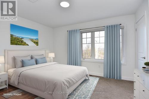 123 - 1890 Rymal Road E, Hamilton, ON - Indoor Photo Showing Bedroom