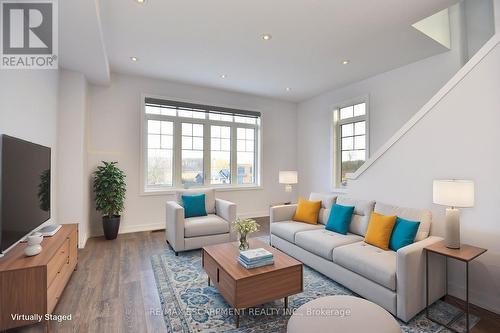 123 - 1890 Rymal Road E, Hamilton, ON - Indoor Photo Showing Living Room