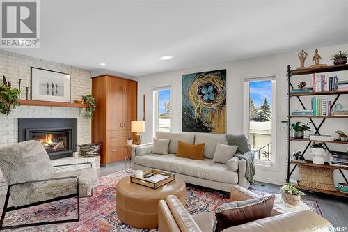 7535 Butler Bay, Regina, SK - Indoor Photo Showing Living Room With Fireplace