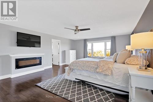 2299 Blessington Road, Tyendinaga, ON - Indoor Photo Showing Bedroom With Fireplace