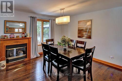 Gas Fireplace / Dining Area - 33895 Bissonette Avenue, Bluewater (St. Joseph), ON - Indoor Photo Showing Dining Room With Fireplace