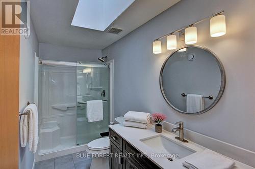 3 Piece Bathroom with Skylight - 33895 Bissonette Avenue, Bluewater (St. Joseph), ON - Indoor Photo Showing Bathroom