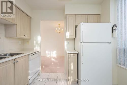 305 - 5039 Finch Avenue E, Toronto, ON - Indoor Photo Showing Kitchen