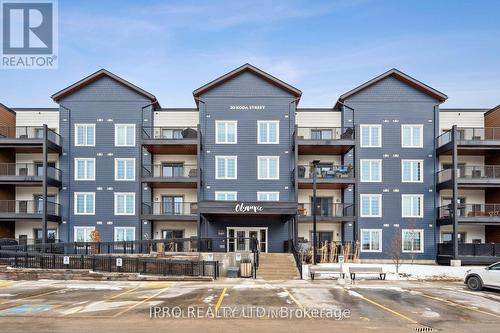 101 - 20 Koda Street, Barrie, ON - Outdoor With Balcony With Facade