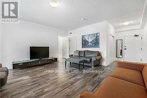 101 - 20 Koda Street, Barrie, ON - Indoor Photo Showing Living Room