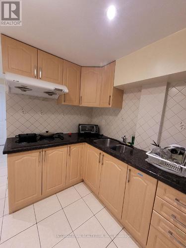 23 Hackett Avenue, Toronto, ON - Indoor Photo Showing Kitchen With Double Sink