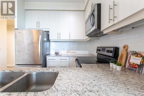 1407 - 3975 Grand Park Drive, Mississauga, ON - Indoor Photo Showing Kitchen With Stainless Steel Kitchen With Double Sink