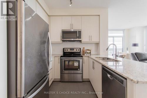 1407 - 3975 Grand Park Drive, Mississauga, ON - Indoor Photo Showing Kitchen With Stainless Steel Kitchen With Double Sink With Upgraded Kitchen