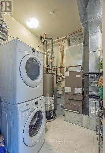 100 - 1705 Fiddlehead Place, London, ON - Indoor Photo Showing Laundry Room