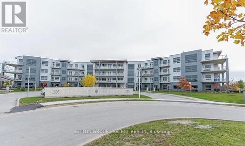 100 - 1705 Fiddlehead Place, London, ON - Outdoor With Facade